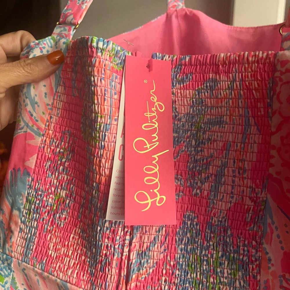 Lily Pulitzer romper. Brand New with tags, never worn. Size 12